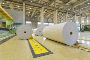 Machines for the production of paper rolls